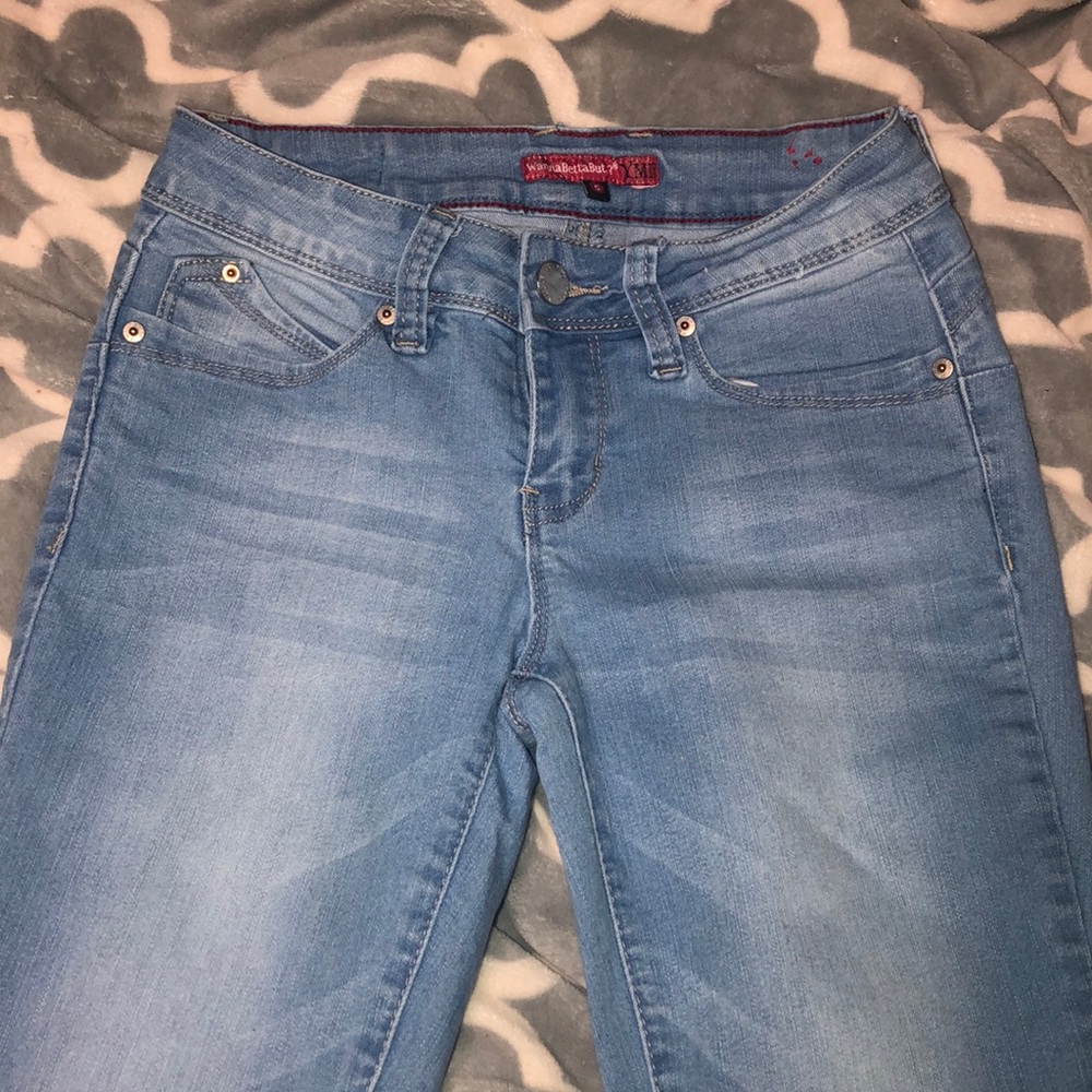 “WannaBettaButt?” Skinny jeans.